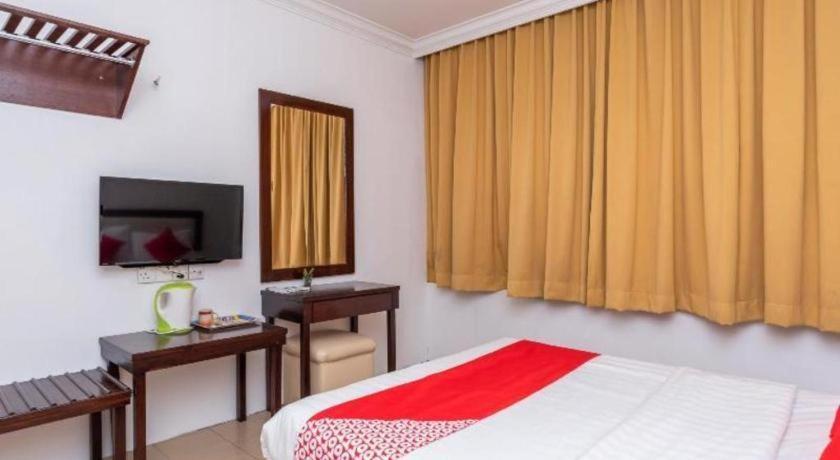 Super Oyo 1114 Neo Pegasus Hotel Сегамат Екстериор снимка